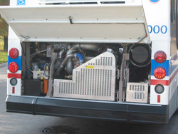 Prototype bus #1000 at Navy Pier during a CTA press conference on November 2, 2005. The 1000-series buses are equipped with a low emission Cummins engine. Each bus produces 60% fewer emissions than the 1991 Flxible Metro buses they replaced.