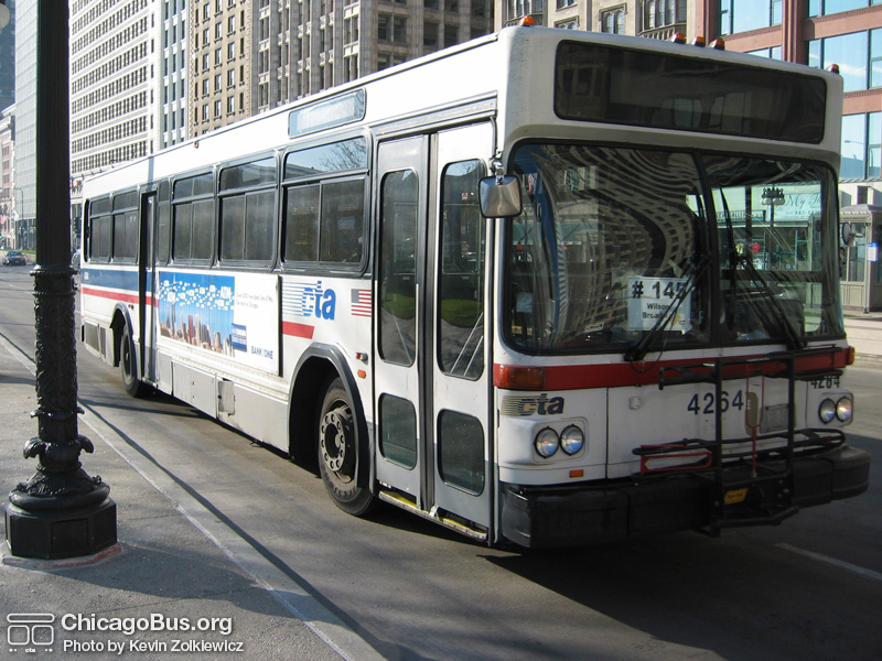Bus #4264 at Michigan and Madison working route #145 Wilson/Michigan Express on November 26, 2003. (Photo by Kevin Zolkiewicz)