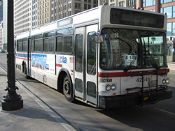 Bus #4264 at Michigan and Madison working route #145 Wilson/Michigan Express on November 26, 2003.
