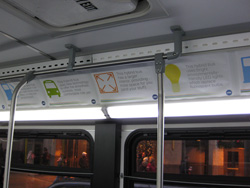 The interior of bus #4015 while working route #147 Outer Drive Express on December 13, 2008. Ad placards inside boasted about the features of the new hybrid buses.