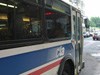Bus #4923 at Jackson and Michigan working route #X28 Stony Island Express on June 10, 2005. The original Pace bus number (2119) is still visible. (Photo by Kevin Zolkiewicz)
