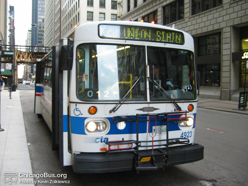 Bus #4923 at Jackson and Michigan working route #X28 Stony Island Express on June 10, 2005. (Photo by Kevin Zolkiewicz)