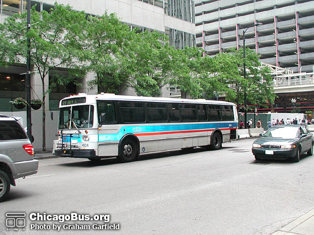 Bus #4924 at Madison and Wells working route #14 Jeffery Express on June 10, 2005. (Photo by Graham Garfield)