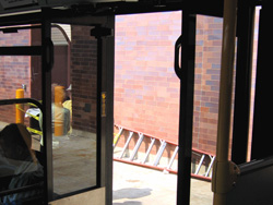 The rear doors of prototype bus #500 while at Skokie Shops on June 17, 2006. Like the 1000-series New Flyers, the rear doors make use of motion sensors, however they open inward instead of outward. (Photo by Robert Madison) The rear doors of prototype bus #500 while at Skokie Shops on June 17, 2006. Like the 1000-series New Flyers, the rear doors make use of motion sensors, however they open inward instead of outward.
