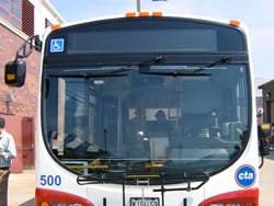 Prototype bus #500 at Skokie Shops on June 17, 2006. Unlike most buses, the windshield wipers on the Optima Opus are mounted at the top of the windshield instead of bottom.
