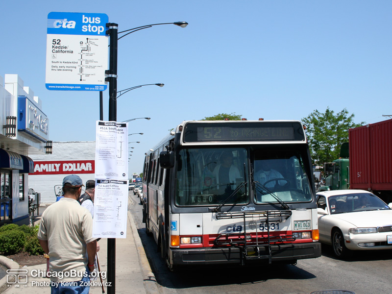 Click to advance to next image. Bus #5531 at Kedzie and Archer working route #52 Kedzie/California on June 8, 2006. Starting June 18, 2006 service on the #52 was extended to 63rd St. during all times of service. An updated bus stop sign, along with service alerts detailing both the #52 and #52A route changes can be seen. (Photo by Kevin Zolkiewicz)