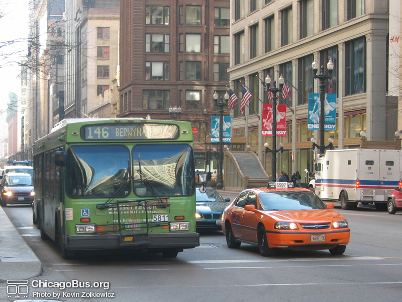 Bus #5811 at State and Washington working route #146 Inner Drive Express on February 26, 2004. (Photo by Kevin Zolkiewicz)
