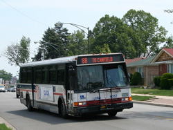 Bus #6057 at Higgins and Talcott working route #88 Higgins on June 16, 2006.