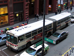 Bus #7396 (former King County Metro #2074) at Jackson and Wells on March 9, 2004.