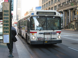 Bus #7405 at State and Washington working route #146 Inner Drive Express on November 26, 2003.