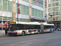 Bus #7535 at Washington and State working route #14 Jeffery Express on February 26, 2004.