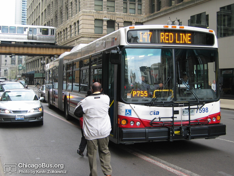 Bus #7598 at Washington and Wabash working route #147 Outer Drive Express on April 28, 2004. (Photo by Kevin Zolkiewicz)