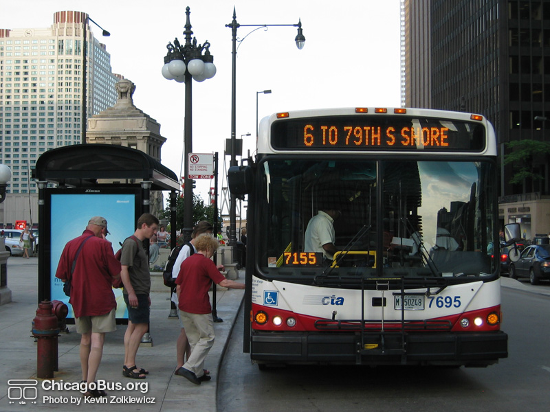 Bus #7695 at Wacker and Michigan working route #6 Jackson Park Express on June 10, 2005. (Photo by Kevin Zolkiewicz)