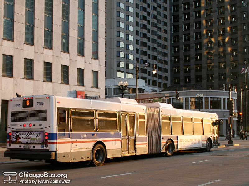 Bus #7706 at Wacker and State working route #6 Jackson Park Express on April 13, 2006. (Photo by Kevin Zolkiewicz)