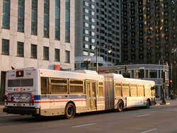 Bus #7706 at Wacker and State working route #6 Jackson Park Express on April 13, 2006.