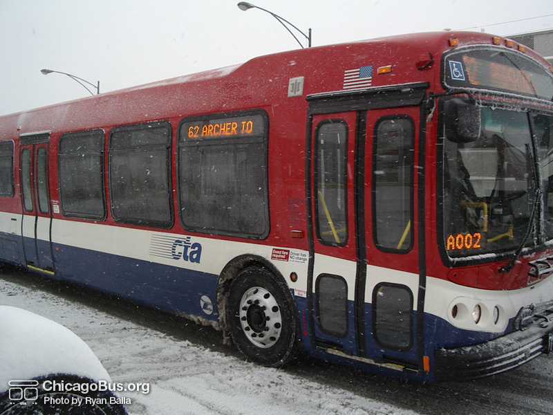 Prototype bus #7800 at Archer and Spaulding working route #62 Archer on January 22, 2005. The bus featured a modified paint scheme, with red as the dominant color. (Photo by Ryan Balla)
