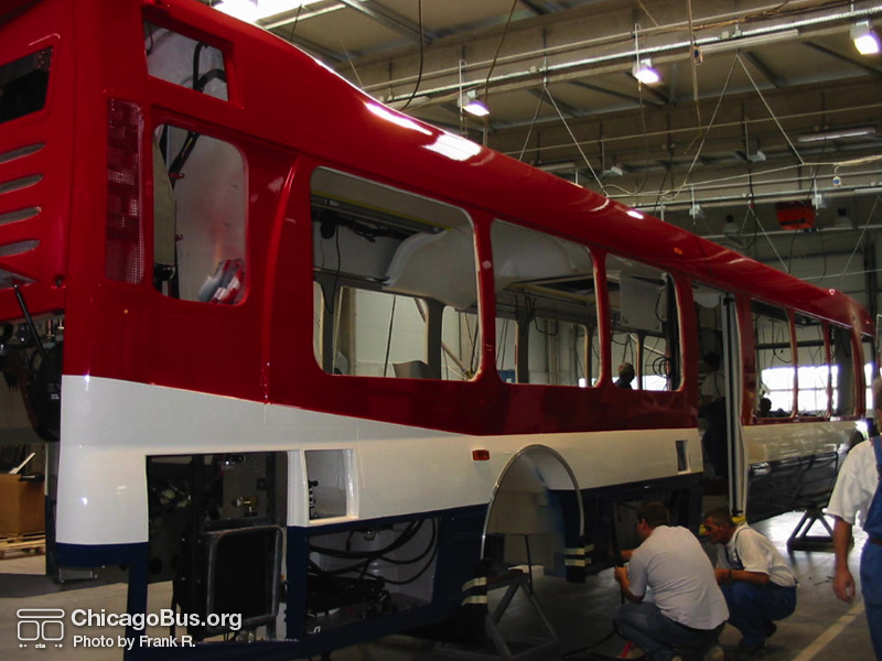Click to advance to next image. NABI employees work on the assembly of CTA's NABI 45C-LFW CompoBus prototype in 2004 at the NABI plant in Anniston, AL. Special thanks to "Family Guy" for providing these rare assembly photos. (Photo by Frank R.)